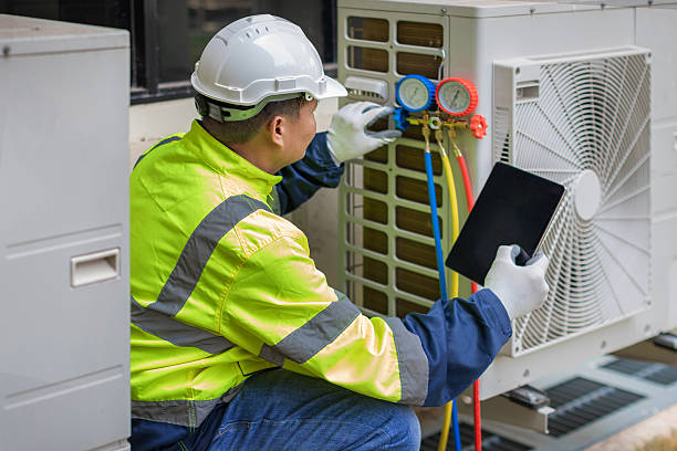 Professional Ac Installation technician working in Little Falls, MN